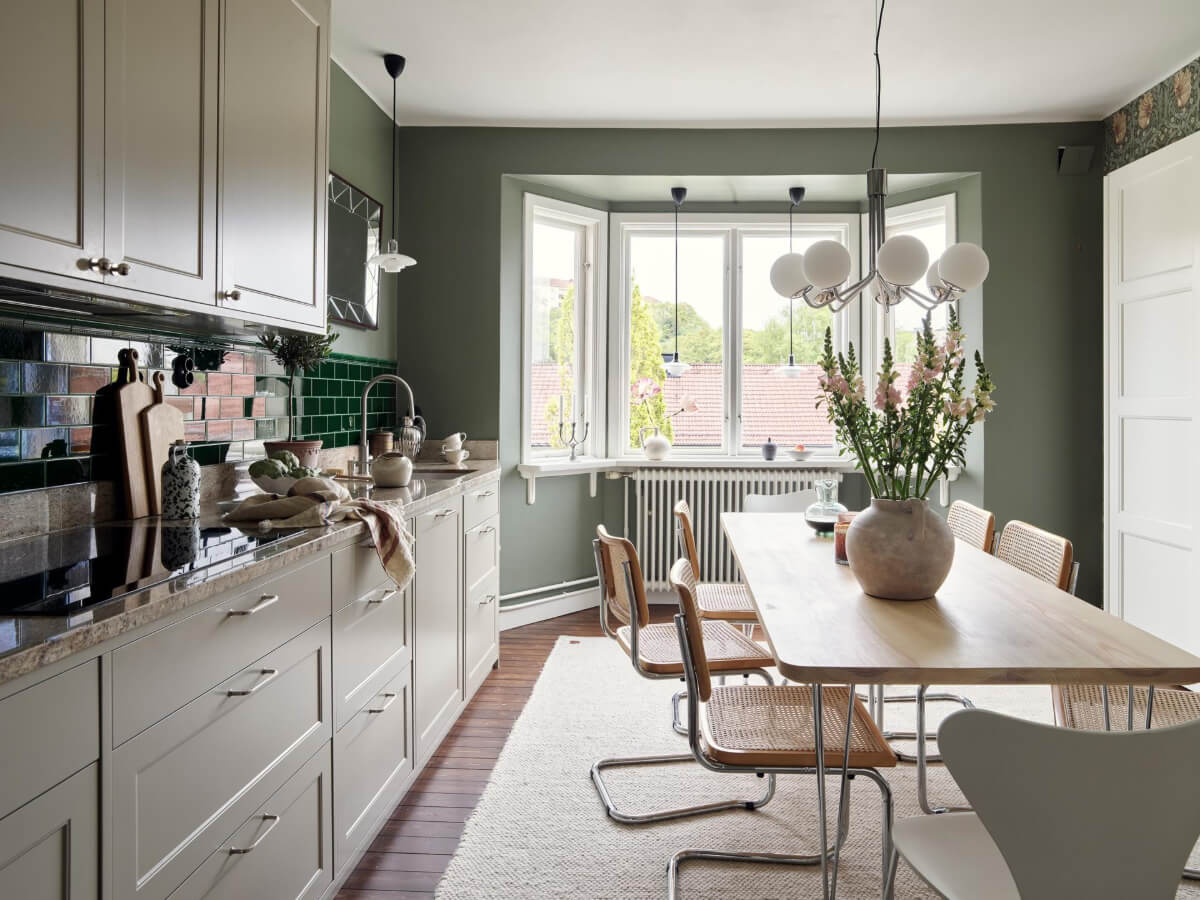 A Harmonious Color Palette in a Swedish Duplex Apartment 2 kitchen bay window large table