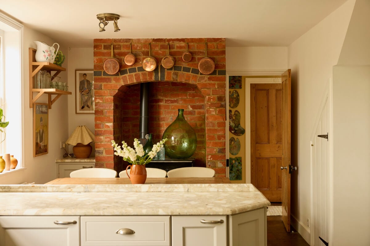 Natural Colors and Materials in a Beautiful Arts and Crafts House 8 kitchen brick hearth