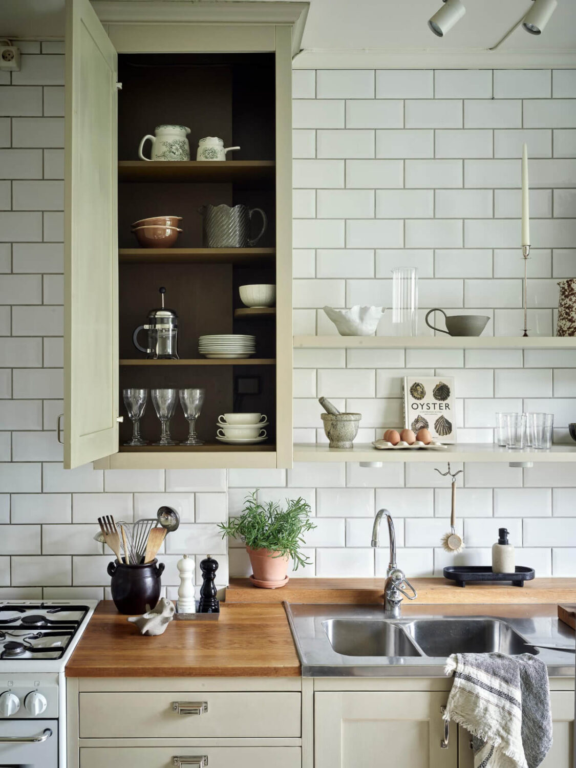 An Apartment with Original Details and a Stunning Period-Style Bathroom 9 kitchen cabinets and shelves
