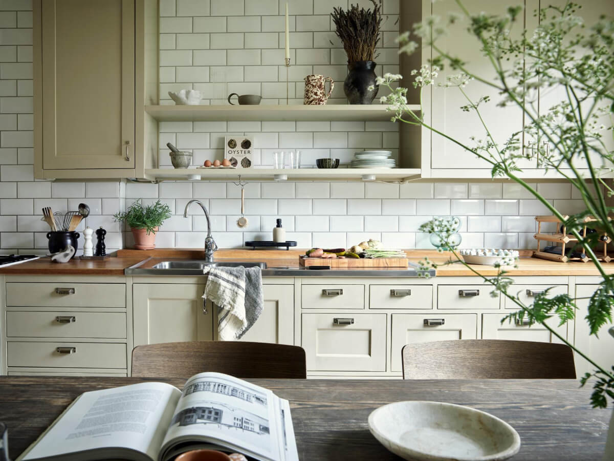 An Apartment with Original Details and a Stunning Period-Style Bathroom 8 kitchen cabinets and shelves white subway tiles