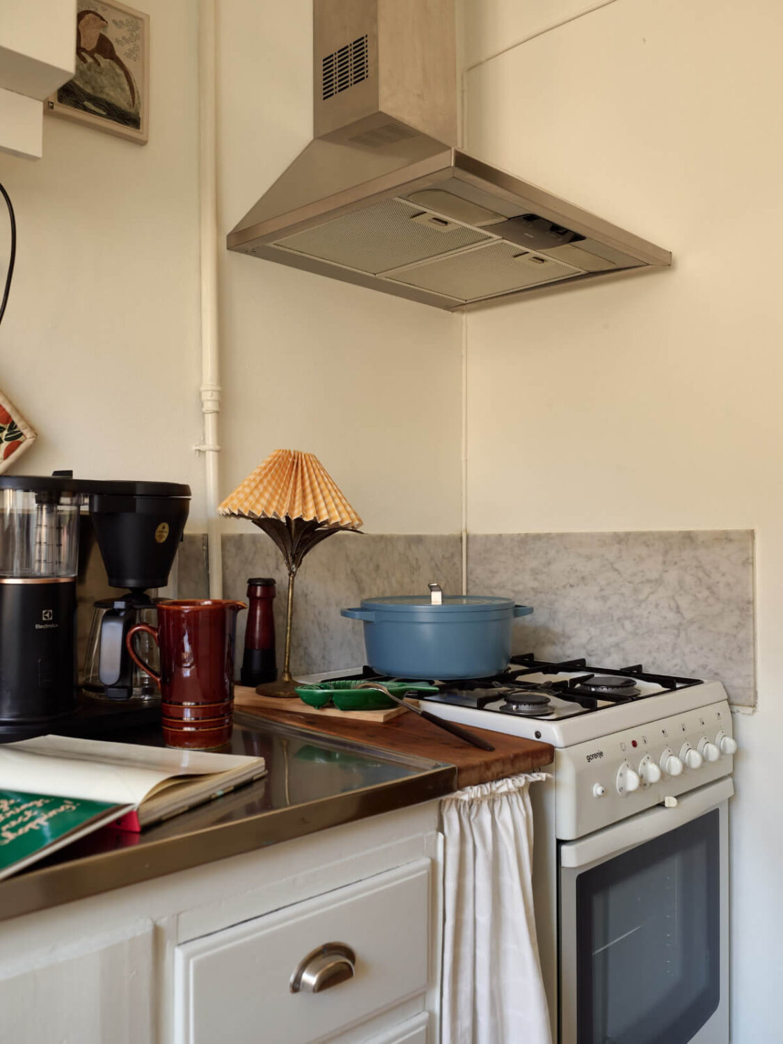Warm Walls and Original Elements in a Swedish Studio Apartment 13 kitchen detail