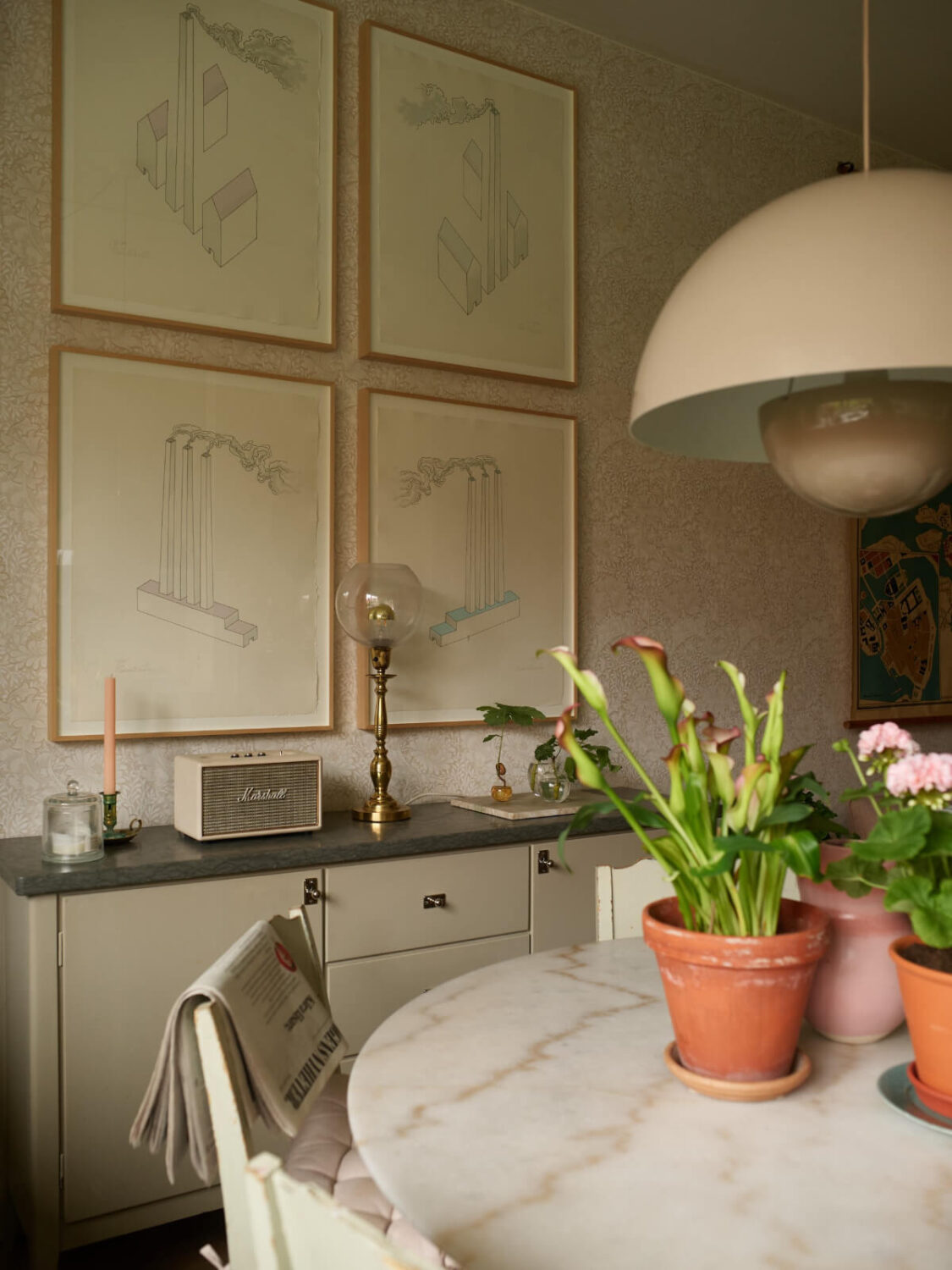 Wallpapers and a Midcentury-Style Kitchen in a 1930s Apartment 15 kitchen detail art