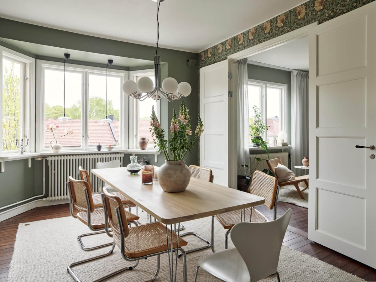 A Harmonious Color Palette in a Swedish Duplex Apartment 7 kitchen dining table bay window