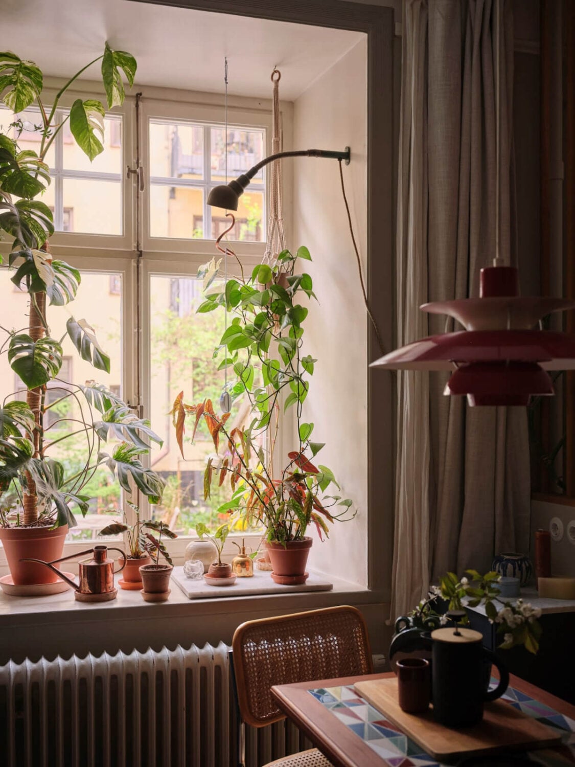 A Fantastic Small Art Nouveau Apartment in Stockholm 7 kitchen window with plants nordroom