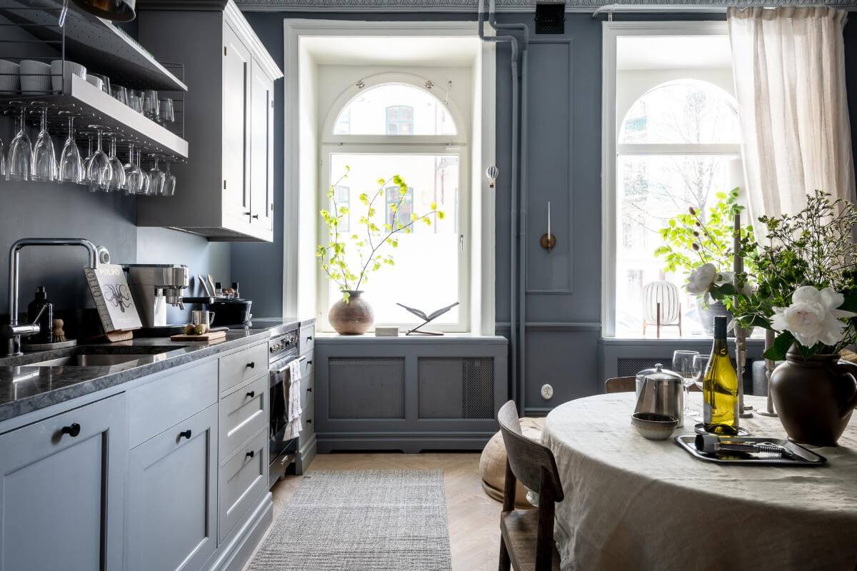 A Blue Studio Apartment with Unique Stucco and Site-Built Storage 7 large arched windows studio apartment