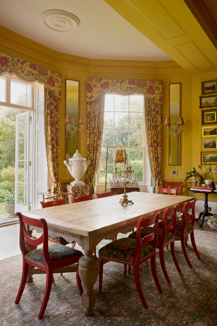 Pattern, Color, and Character in a Historic Country House Apartment 3 large dining table red chairs