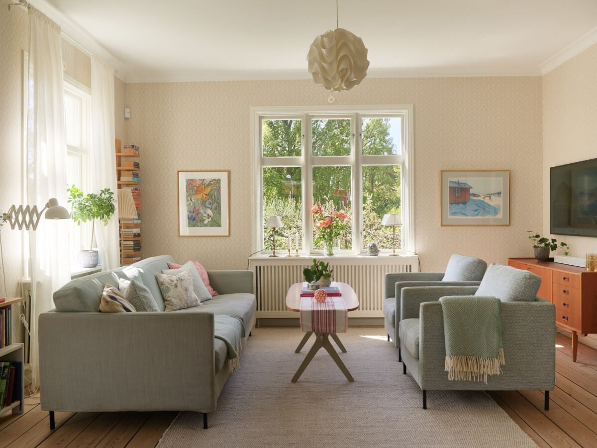 Light-Filled Rooms and Wallpapers in a Swedish Country House 2 large windows light scandi living room wooden floor