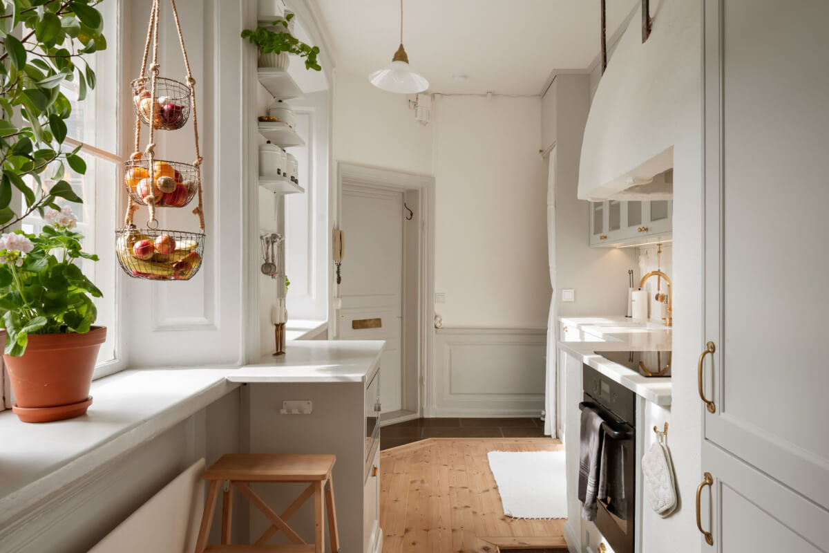 A Charming Attic Apartment in Stockholm's Gamla Stan 11 light classic kitchen gamla stan apartment