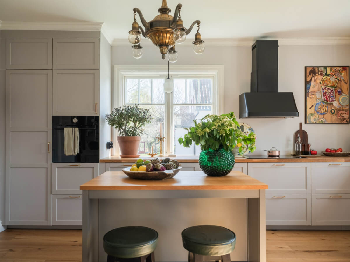 An Early 20th-Century Family Home Decorated with Color and Art 12 light gray kitchen wooden countertop