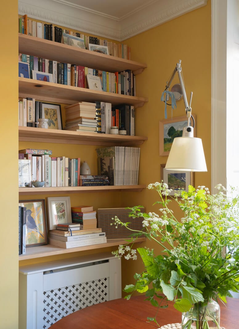 A Family Home with a Cheerful Color Palette in a Historic House 3 living room bookshelves