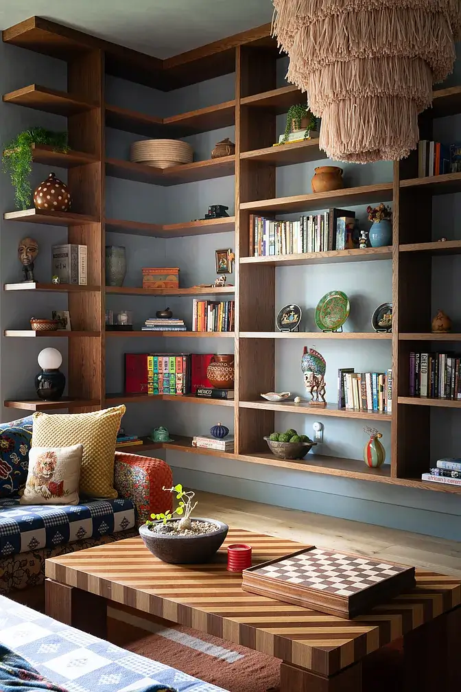 A Creative Sanctuary in Sherman Oaks Designed by Mendy Cheng 3 living room custom bookshelves