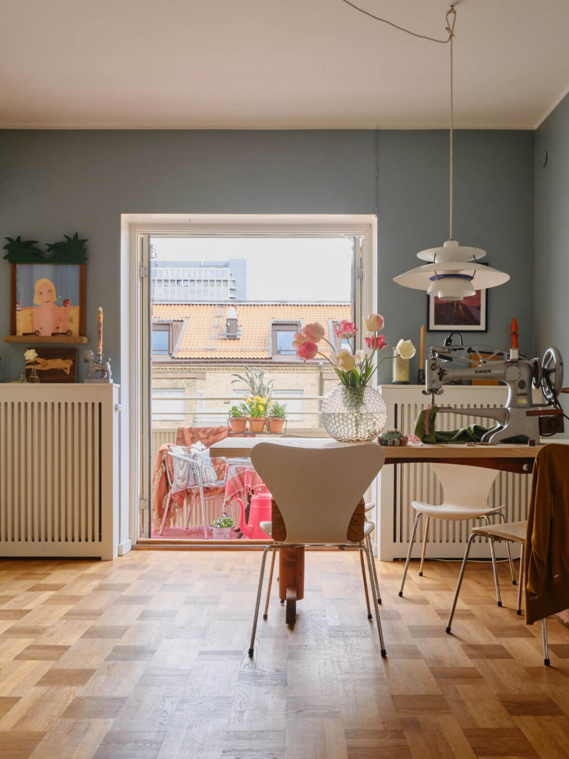 A Colorful 1940s Apartment with Original Elements 4 living room dutch parquet floor