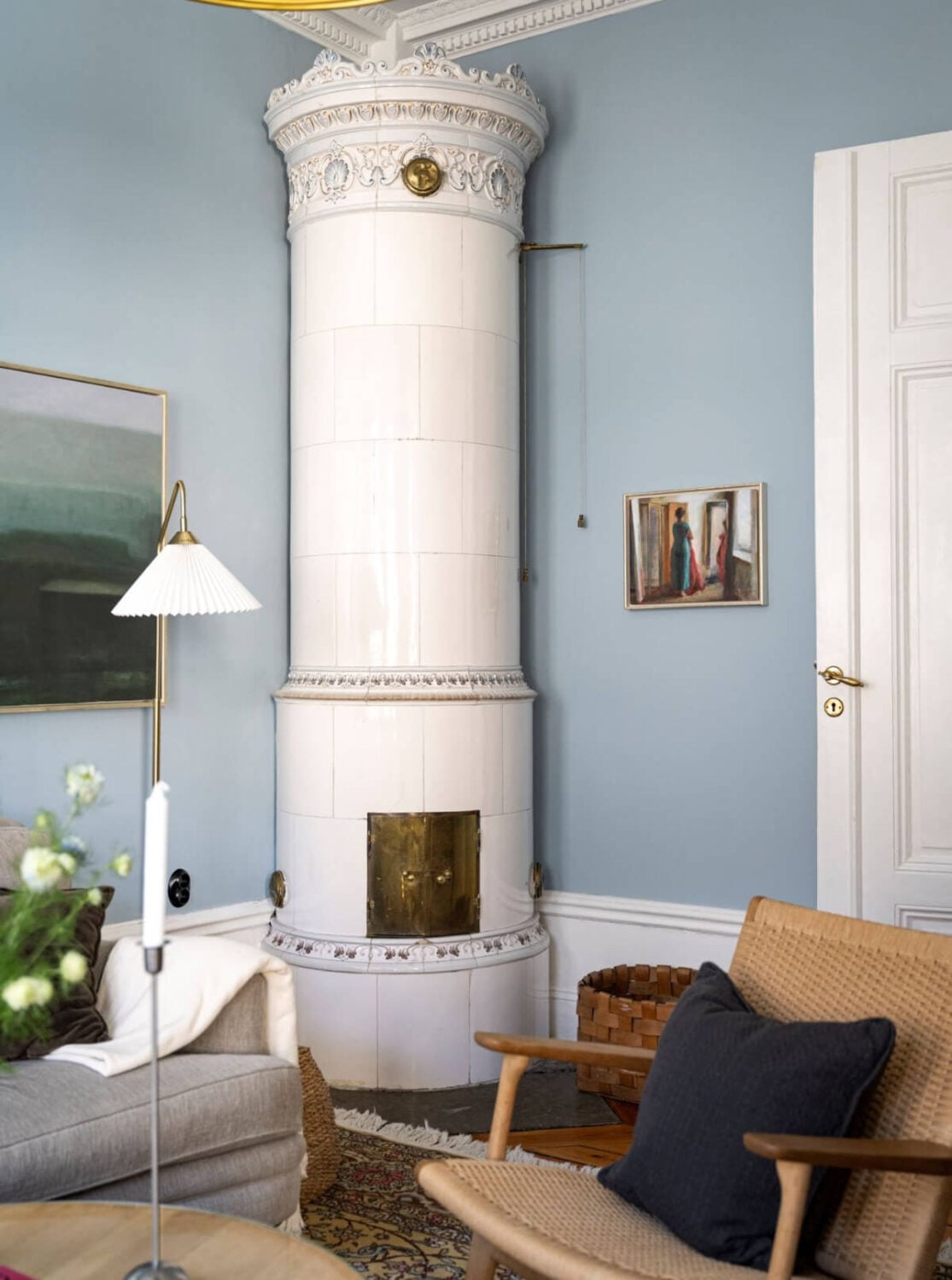 Wallpapers and Blue Tones in a Cozy Turn-of-the-Century Home 3 living room fireplace