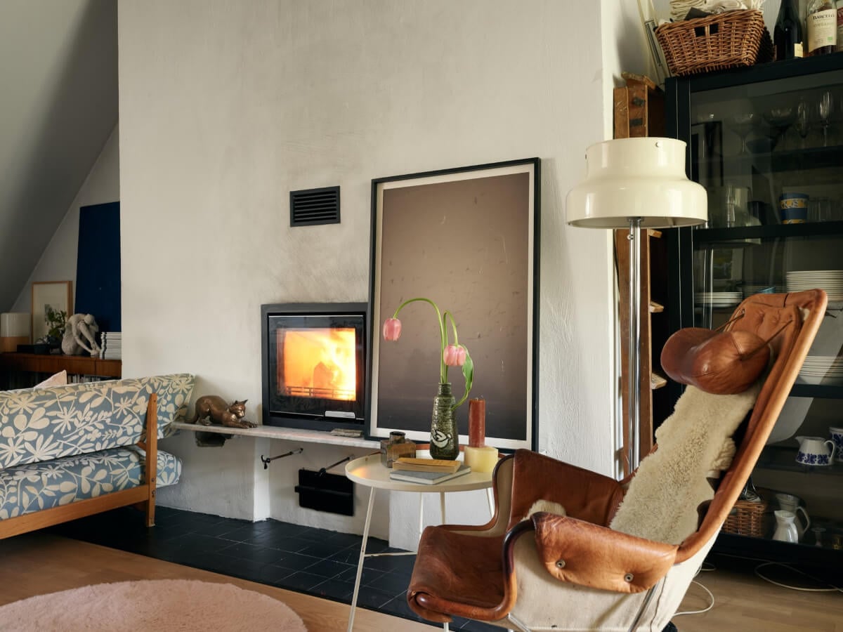 A Stunning Top-Floor Apartment with High Ceilings in a Former Church 15 living room fireplace