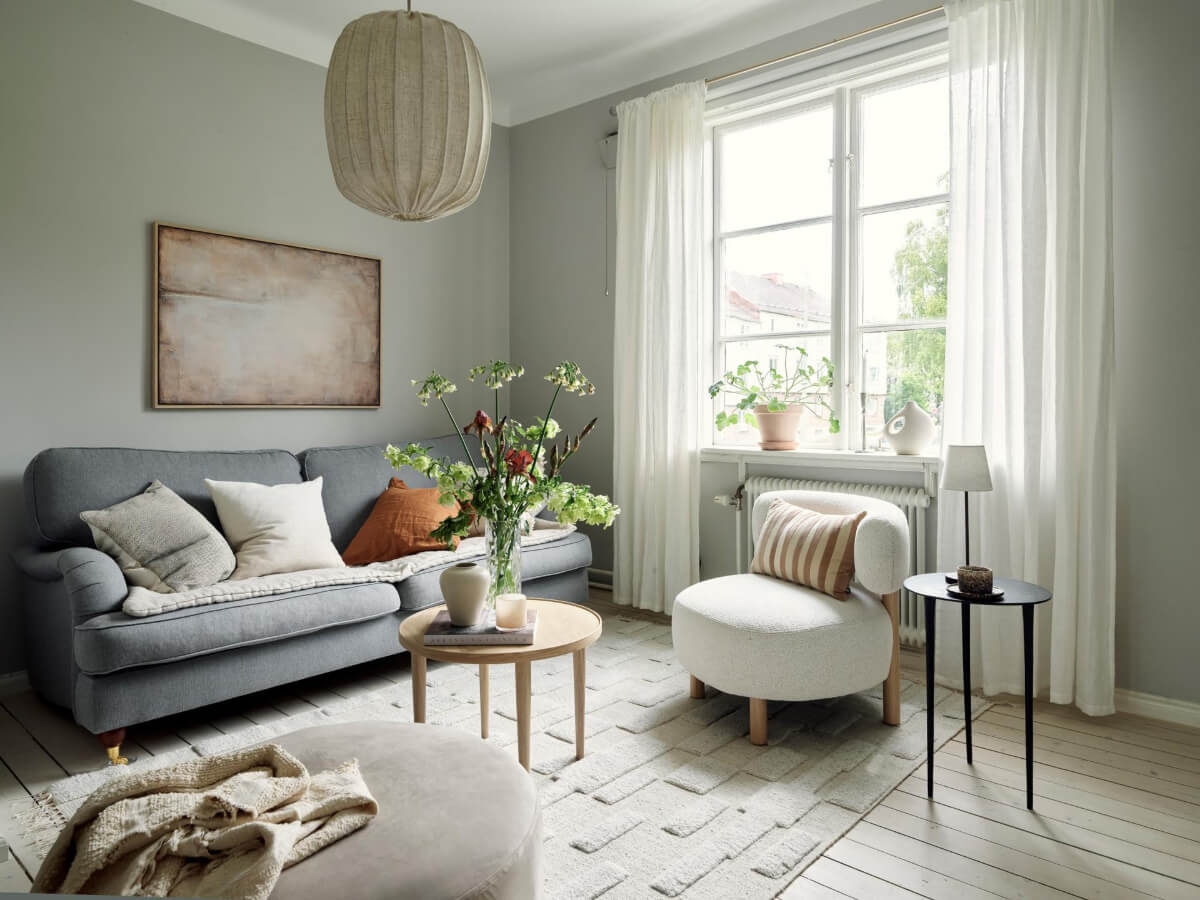 An Apartment with Original Details and a Stunning Period-Style Bathroom 13 living room gray walls wooden floor