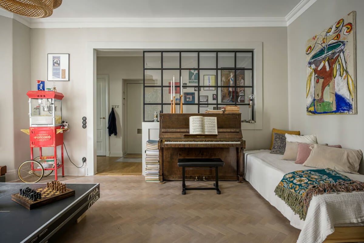 A Spacious One-Bedroom Apartment in Gothenburg 4 living room herringbone parquet floor industrial inner window nordroom