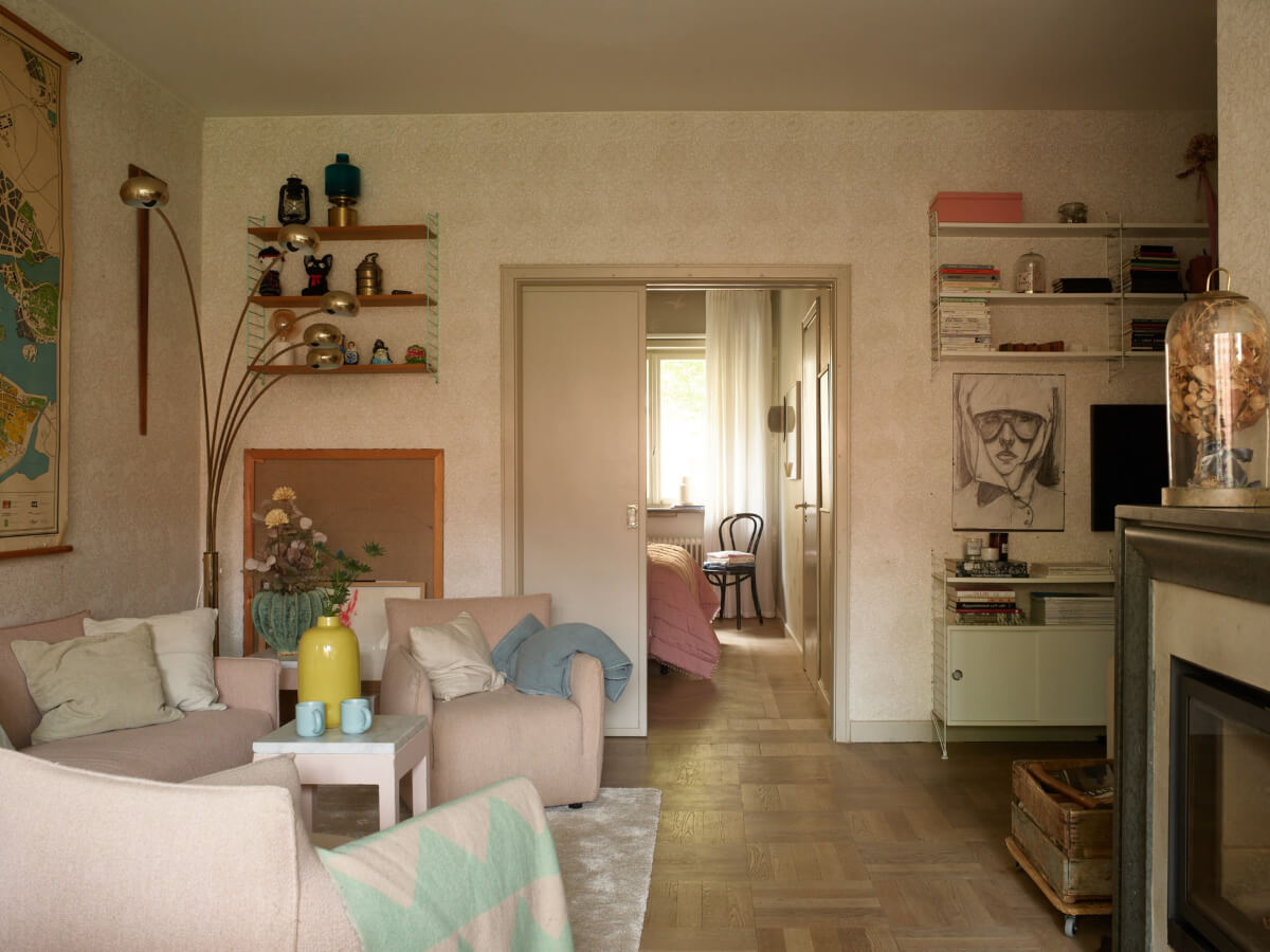 Wallpapers and a Midcentury-Style Kitchen in a 1930s Apartment 4 living room parquet floor fireplace