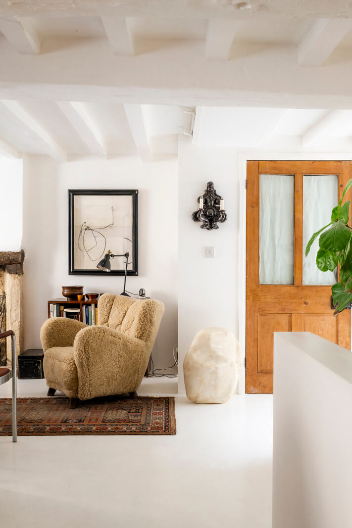White-Washed Walls and Rustic Elements in a 17th Century Townhouse 5 living room white walls and beams
