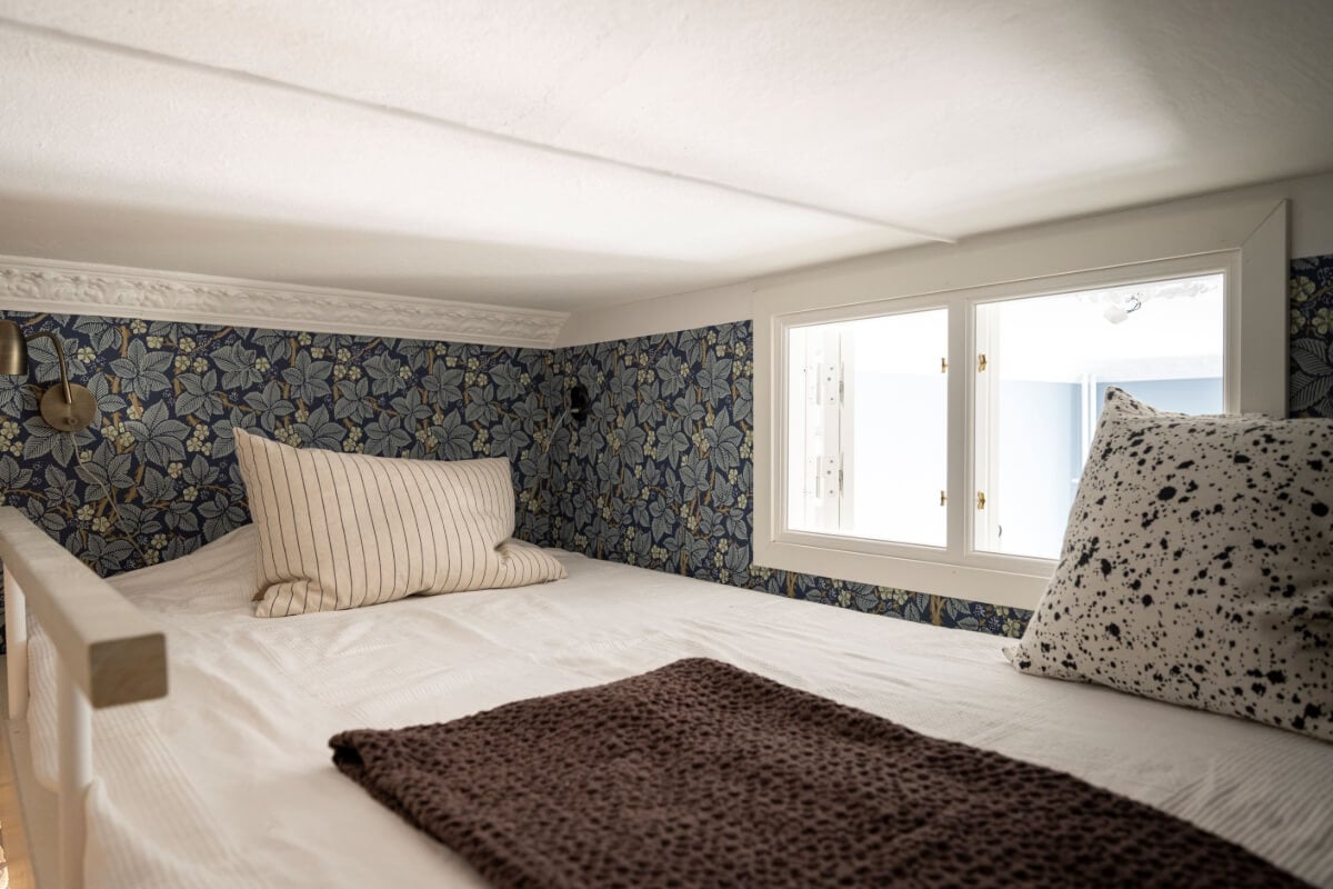 Wallpapers and Blue Tones in a Cozy Turn-of-the-Century Home 27 loft bed