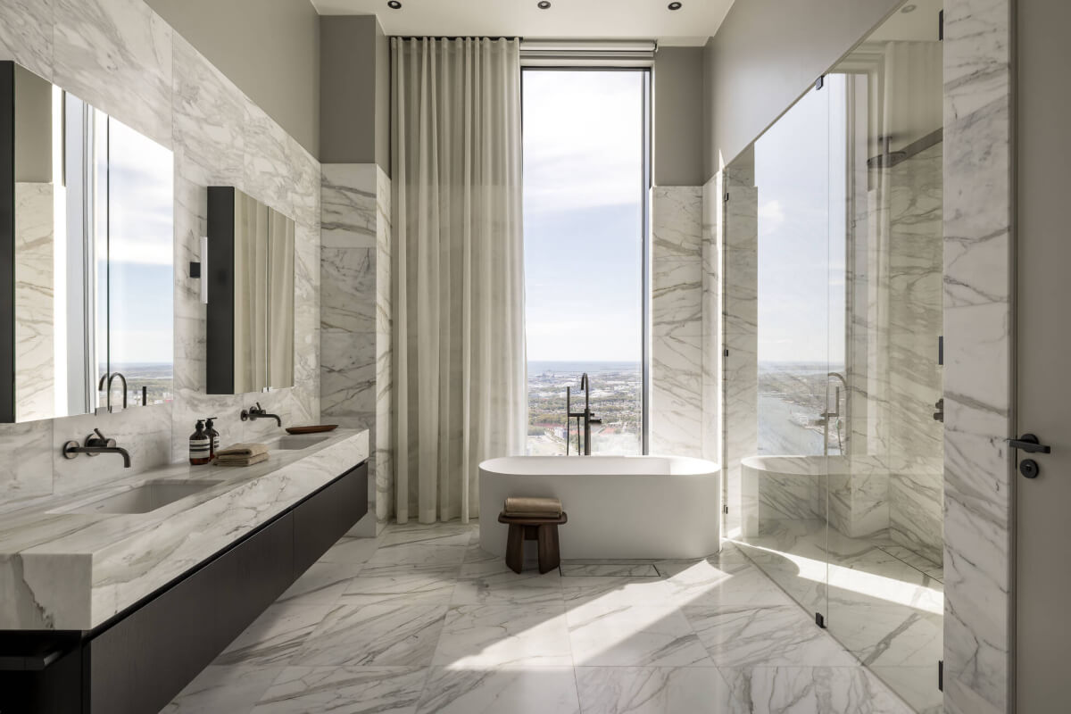 A Luxurious Three-Storey Penthouse in Sweden’s Tallest Residential Tower 14 marble tiles large bathroom