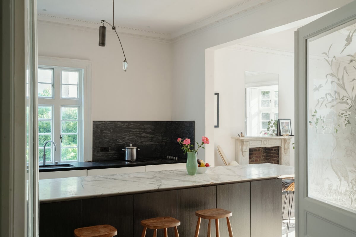 Grand, Light-Filled Spaces in a Gothic-Style English Coastal Home 7 modern kitchen marble countertop