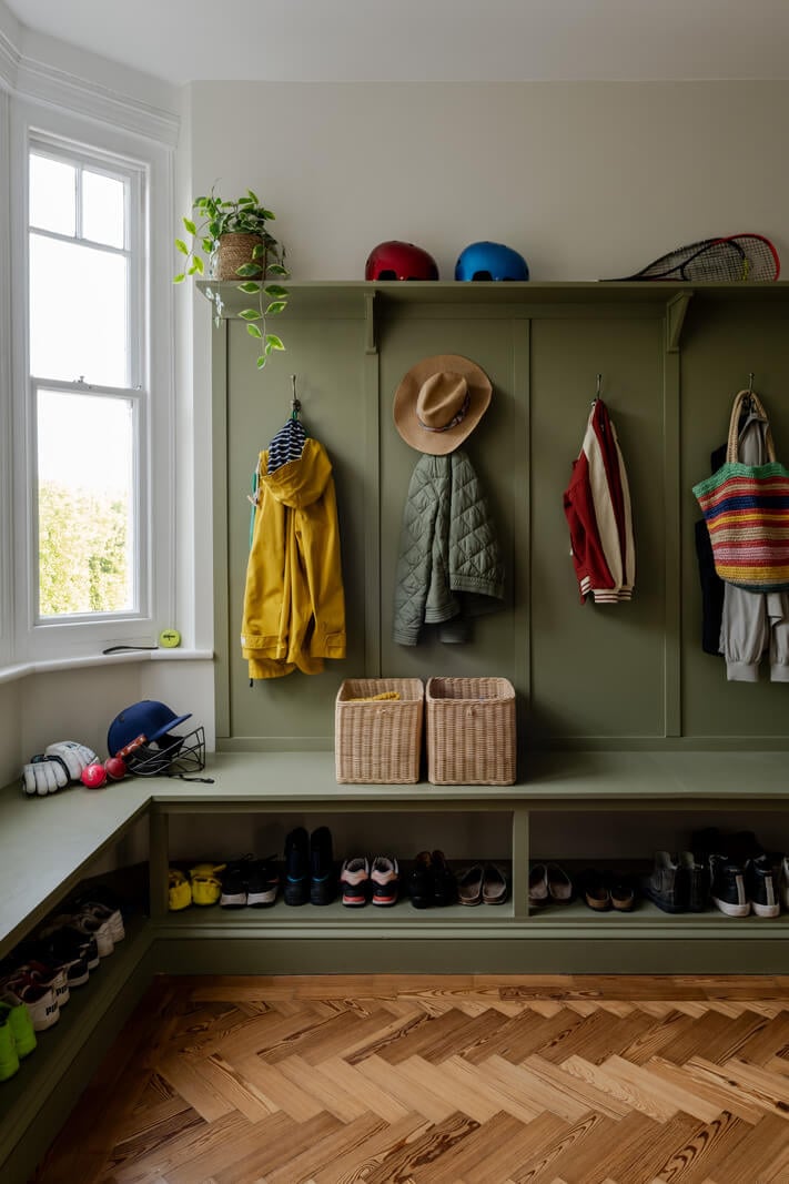 A Grand Edwardian Villa with a Yellow Kitchen and Coastal Views 30 mudroom green storage