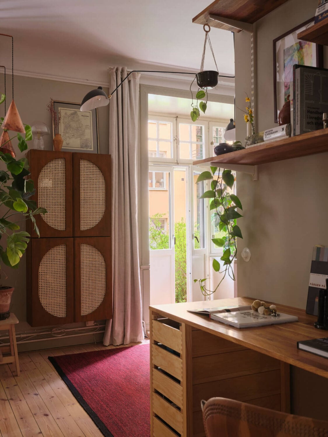 A Fantastic Small Art Nouveau Apartment in Stockholm 16 open layout floating wooden cabinets with cane detailing desk nordroom