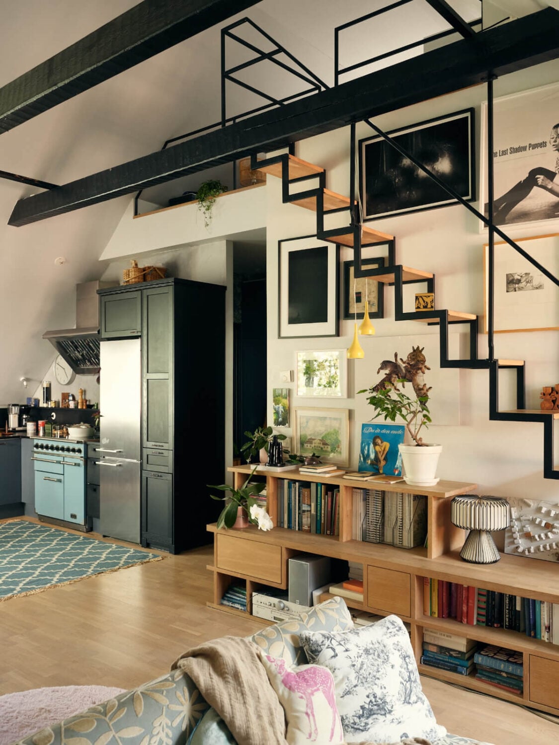 A Stunning Top-Floor Apartment with High Ceilings in a Former Church 11 open plan living space loft stiars