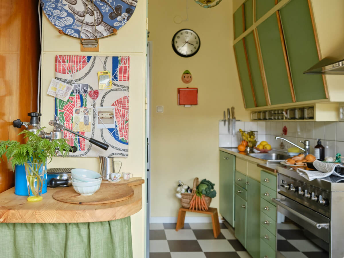 A Colorful 1940s Apartment with Original Elements 13 original green and yellow midcentury kitchen