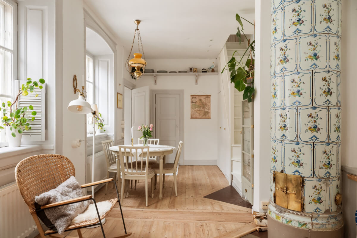 A Charming Attic Apartment in Stockholm's Gamla Stan 3 painted fireplace living room old apartment