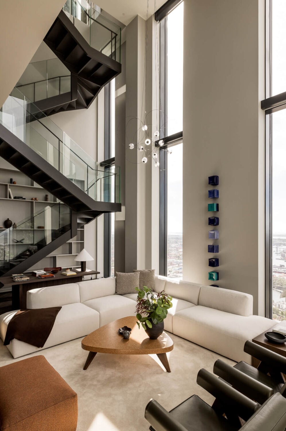 A Luxurious Three-Storey Penthouse in Sweden’s Tallest Residential Tower 4 penthouse living room steel staircase