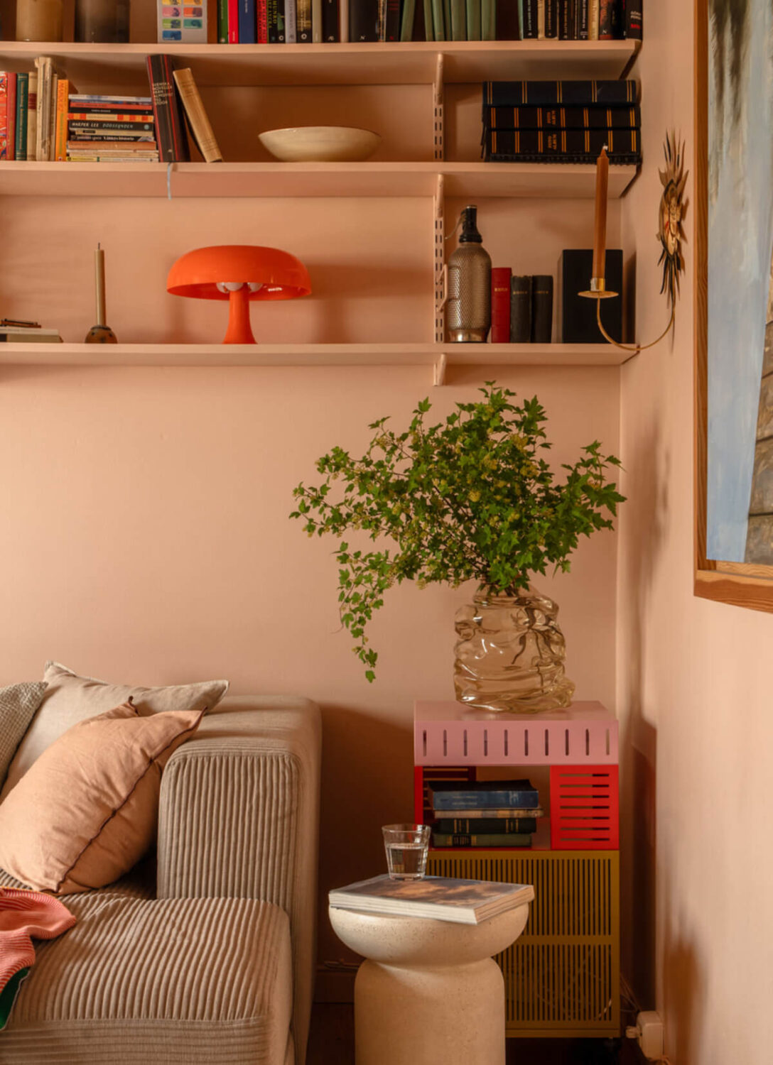 A Stylish and Joyful Color and Material Palette in a Midcentury Apartment 6 pink living room shelves