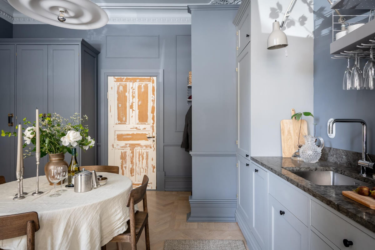 A Blue Studio Apartment with Unique Stucco and Site-Built Storage 8 raw wooden doors studio apartment