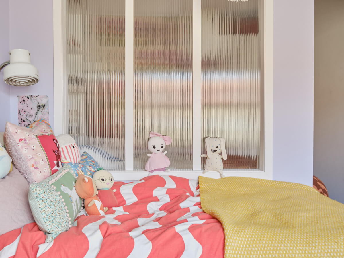 A Colorful 1940s Apartment with Original Elements 24 ribbed glass room divider