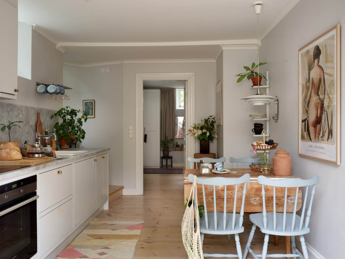 A Stylish Basement Apartment with a Private Terrace 12 scandi kitchen with wooden table
