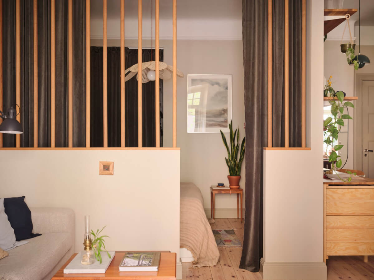A Fantastic Small Art Nouveau Apartment in Stockholm 12 semi open layout living room bedroom velvet curtains