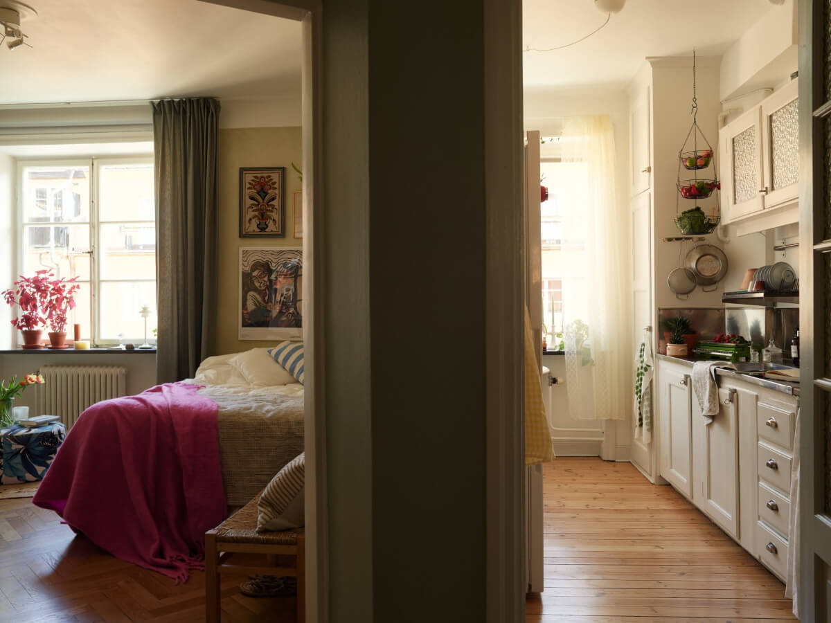 Warm Walls and Original Elements in a Swedish Studio Apartment 8 separate kitchen studio apartment