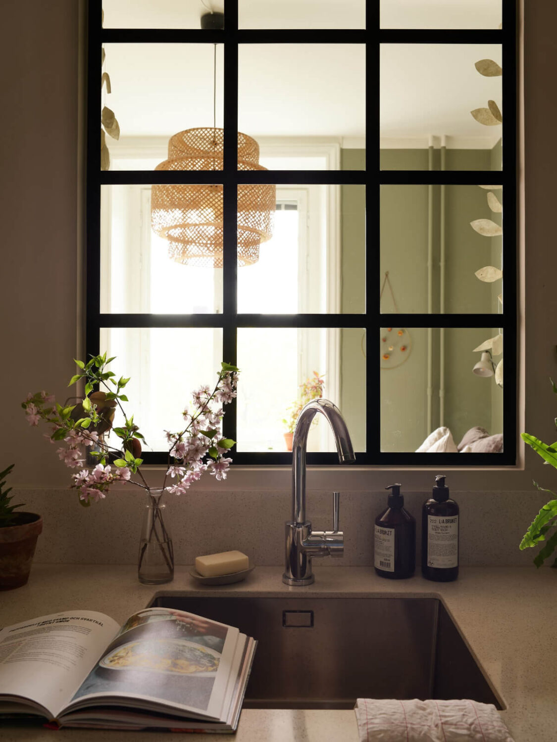 A Beautifully Renovated Early 20th-Century Apartment 14 sink and window detail