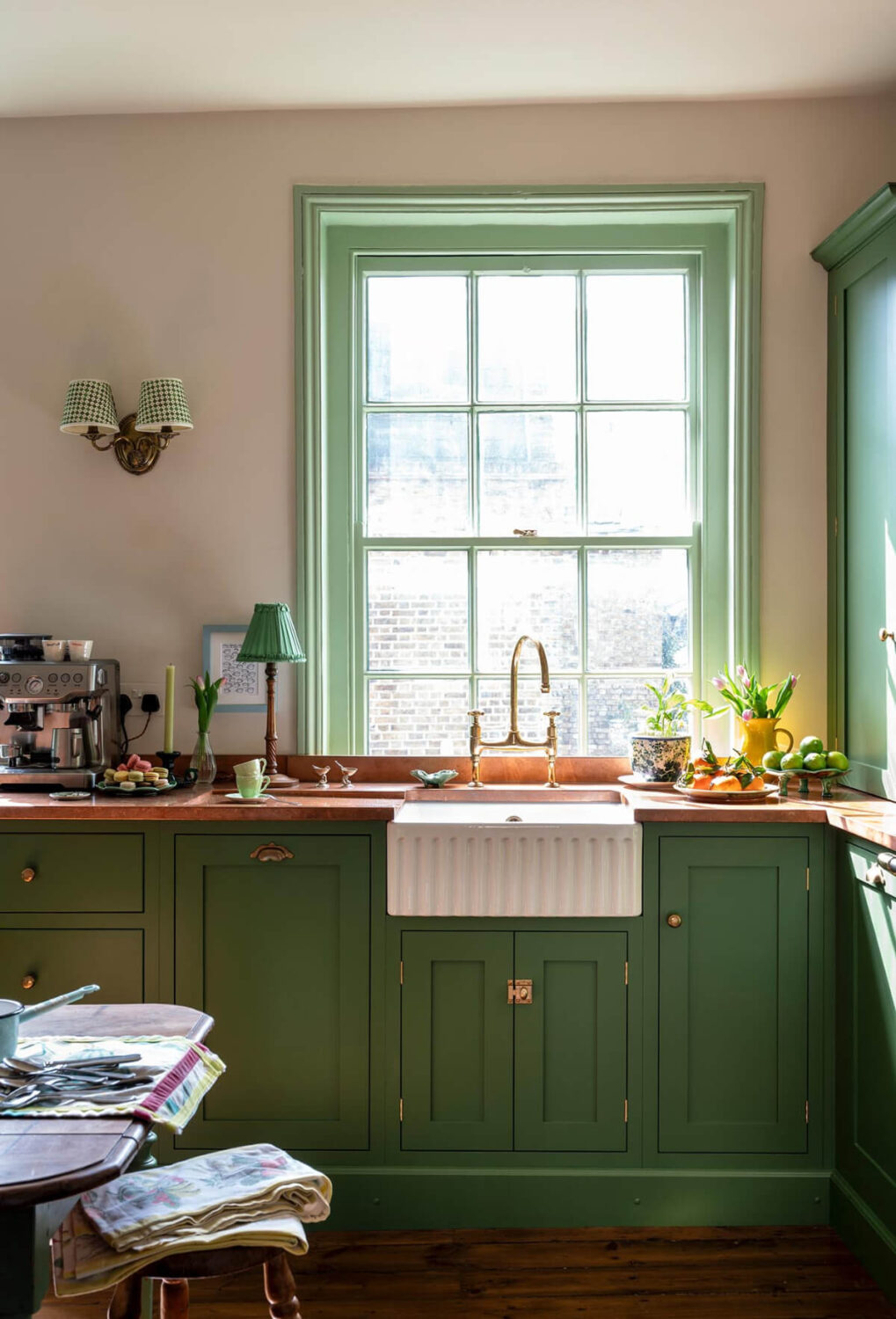 A Small, Green deVOL Kitchen in a 17th-Century London Mews House 3 sink under large window devol shaker kitchen nordroom