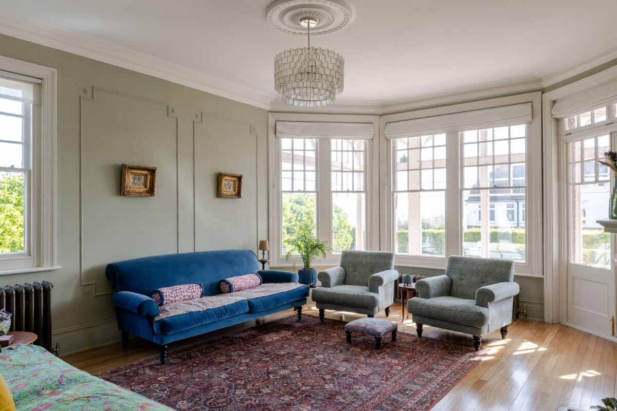 A Grand Edwardian Villa with a Yellow Kitchen and Coastal Views 14 sitting room bay window