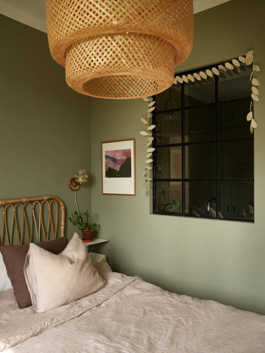 A Beautifully Renovated Early 20th-Century Apartment 19 small green bedroom indoor window to kitchen
