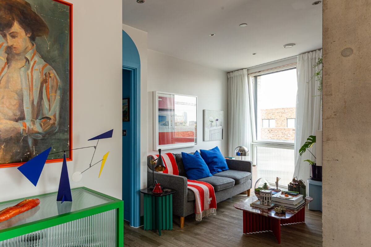Playful Colors in a Modern One-Bedroom Apartment in London 2 small living room colorful decor