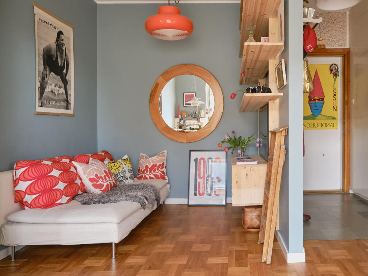 A Colorful 1940s Apartment with Original Elements 3 small sitting room wooden shelves