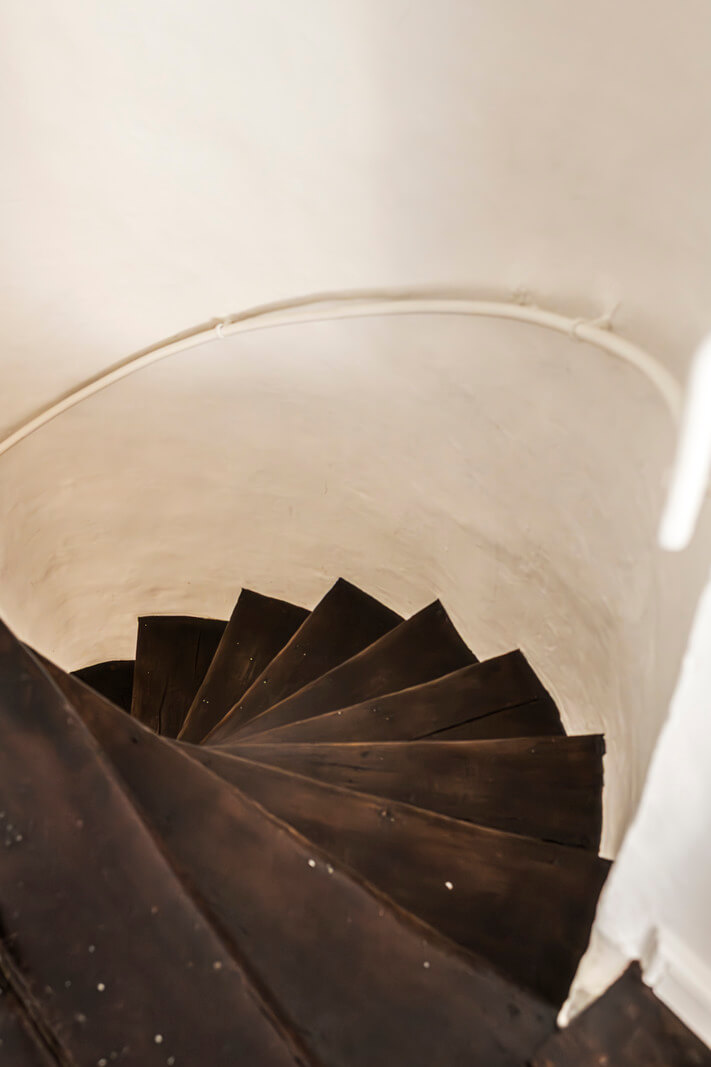 White-Washed Walls and Rustic Elements in a 17th Century Townhouse 13 spiral staircase