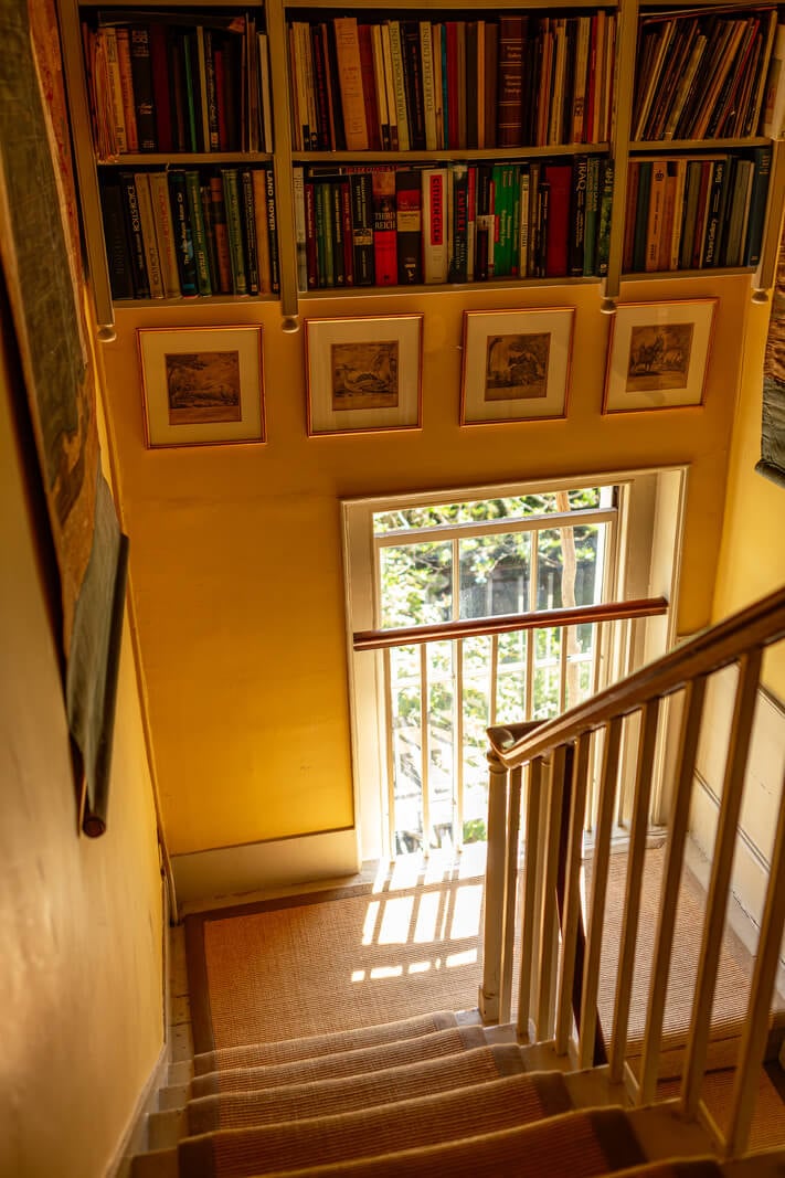 A Carefully Restored Georgian Townhouse in East London 14 staircase with bookshelves