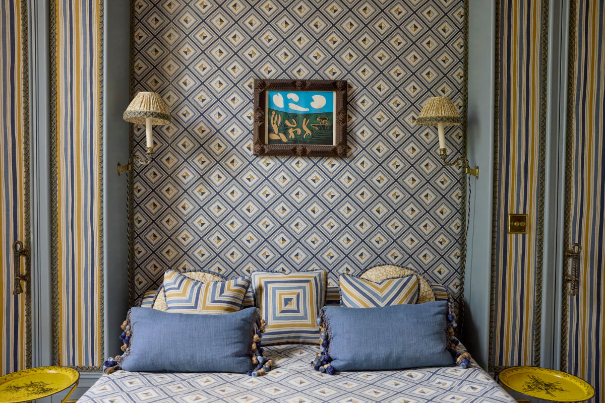 Pattern, Color, and Character in a Historic Country House Apartment 21 striped and geometric wallpaper blue tones bedroom