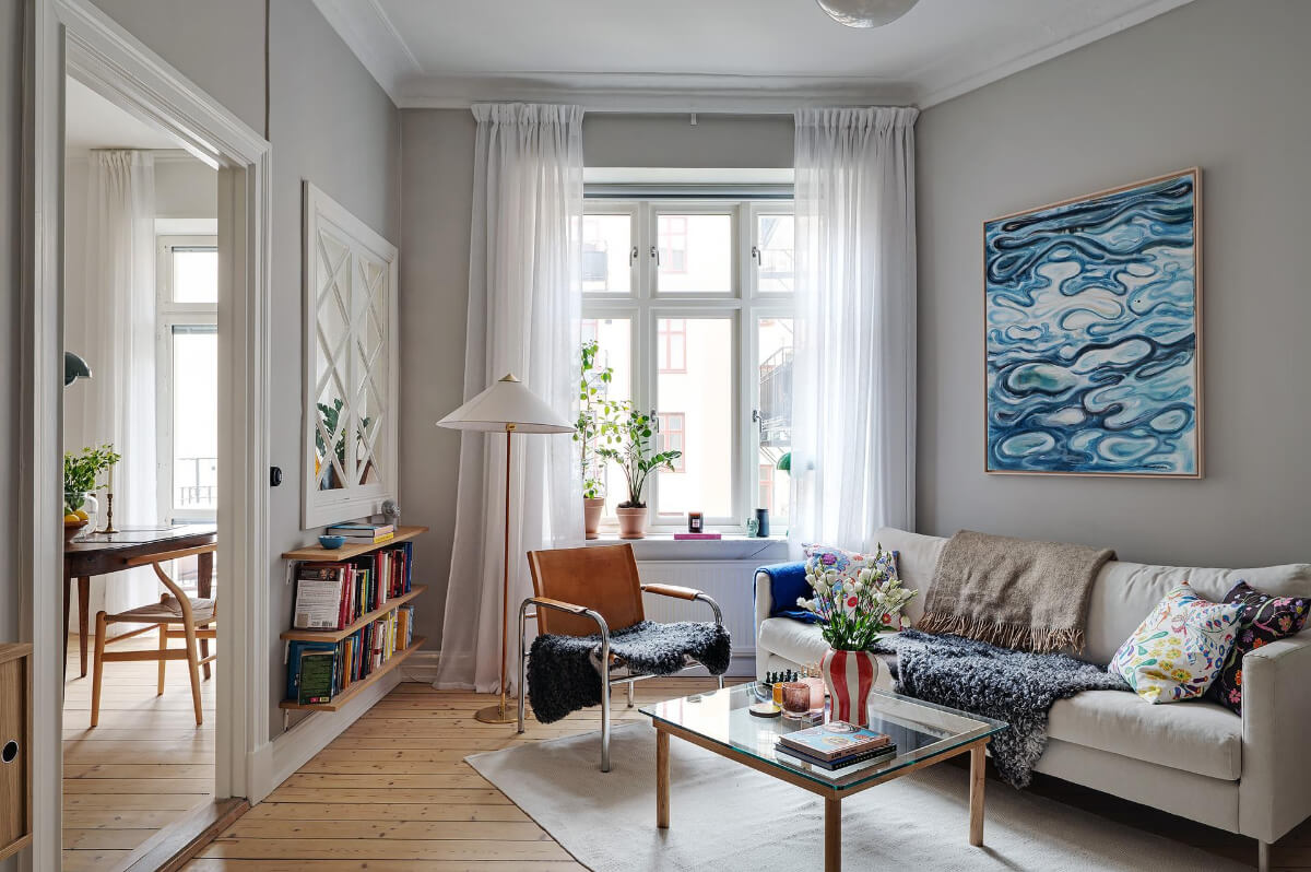 Classic Elements in a Charming Swedish Studio Apartment 5 studio apartment large window