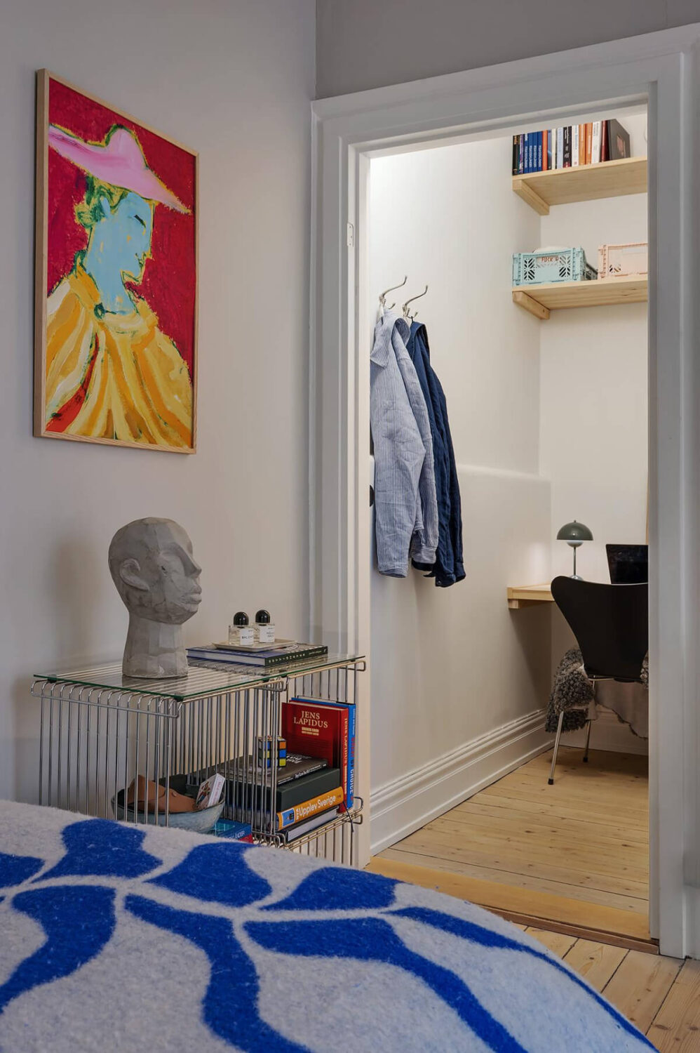 Classic Elements in a Charming Swedish Studio Apartment 9 studio view into tiny room home office