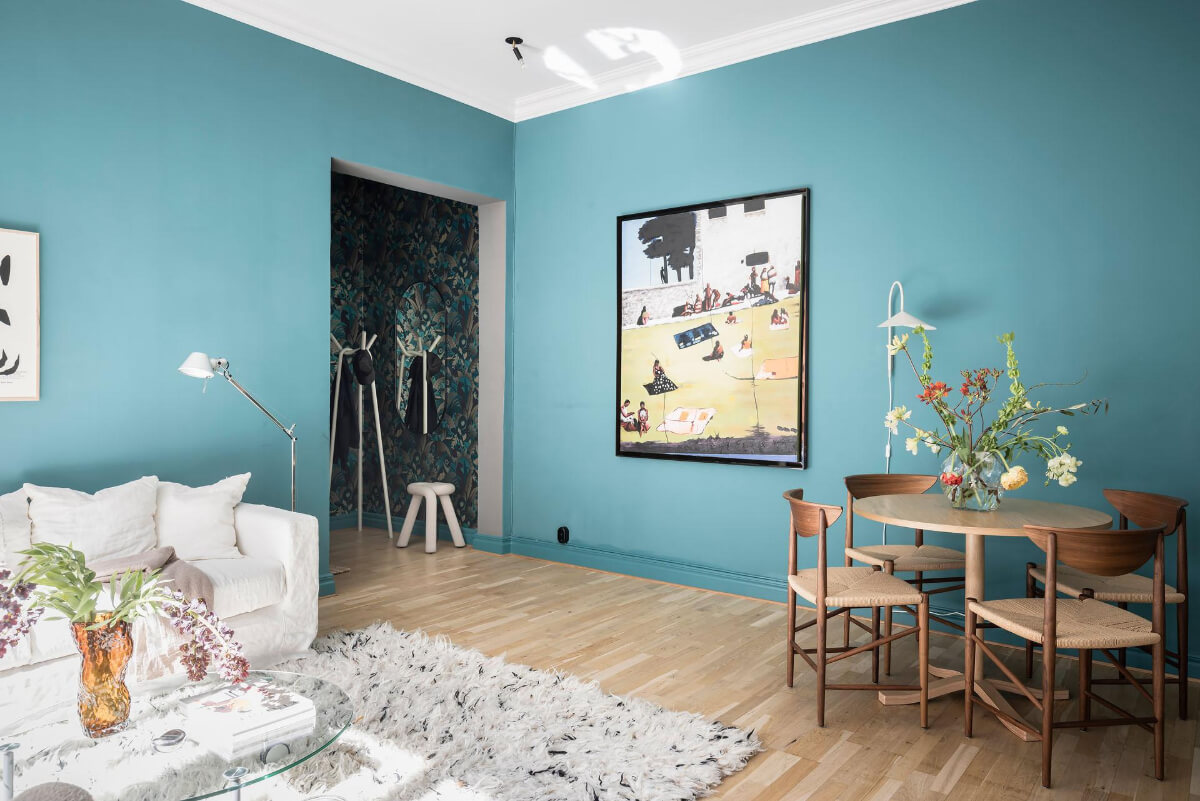 A Teal Green Living Room and Large Windows in a Swedish Apartment 7 teal green living room round dining table