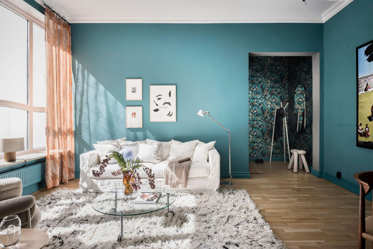 A Teal Green Living Room and Large Windows in a Swedish Apartment 6 teal green walls scandi living room